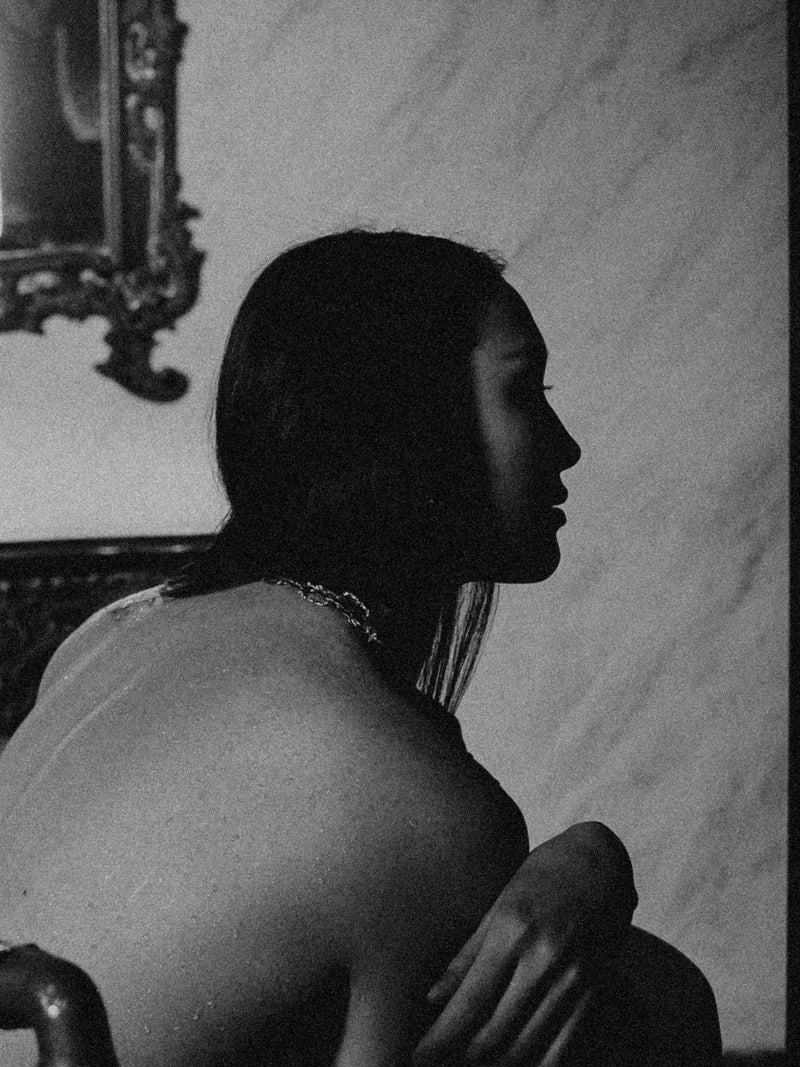 indoor candid showing Ilford Delta 3200 film emulation look in Lightroom